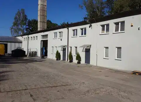 View of the old factory building, now serving as a support facility.