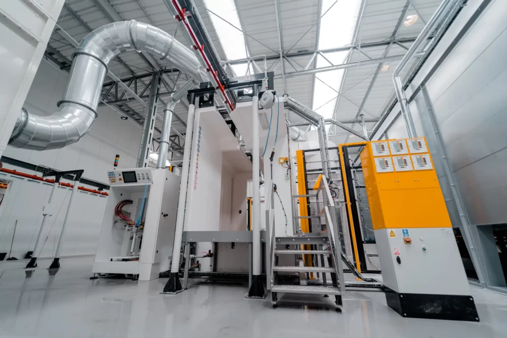 Automated powder coating facility with advanced robotic systems at Masuria Industry